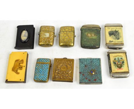 Nine various vesta cases including a pair of simulated crocodile skin vestas, a bakelite example decorated with an oval photo