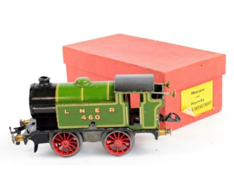A boxed Hornby clockwork engine "LNER 460" in green livery, stamped "Hornby manufactured by Meccano Ltd Liverpool".