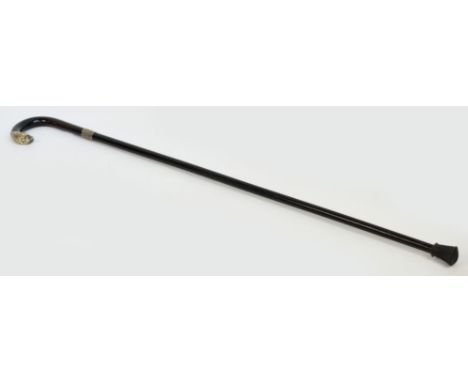 A silver mounted ebonised walking stick, length 84cm.