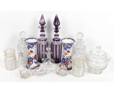 A small quantity of clear glass ware including pair of decanters, oval salts, etc, also a near pair of clear and purple glass