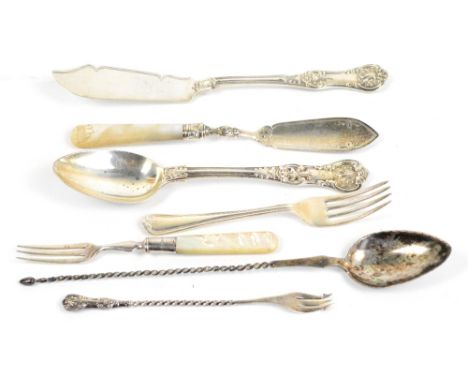 Seven pieces of silver flatware comprising a mother of pearl handled butter knife and salad fork, fish slice, spoon fork, pic