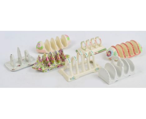 Seven vintage ceramic toast racks to include Copeland, Royal Winton chinse "Summer Time", etc. CONDITION REPORT: Royal Winton