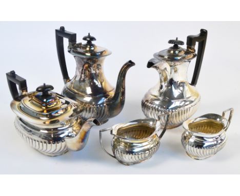 A four piece Sheffield electroplated tea service comprising teapot, coffee pot, twin handled sugar bowl and a cream jug, also