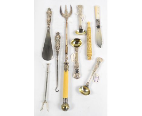 A pair of Victorian hallmarked silver mustard spoons with cast foliate scroll decoration, Thomas Wallis, London 1842, a simil