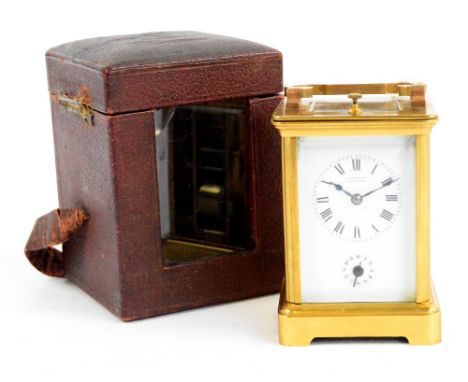 An early 20th century French brass cased repeating carriage clock with alarm, retailed by A. Aubert, Lausanne, the square whi