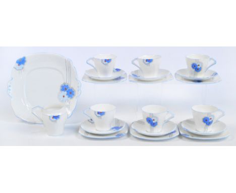 A part Bell China tea service in Art Deco design of stripes and blue flowers, comprising a sandwich plate, jug, six tea plate