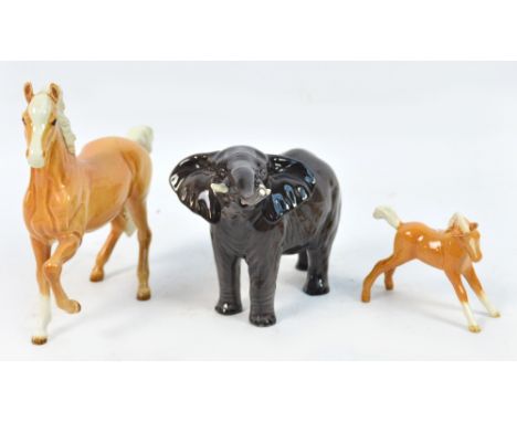 A Beswick model of a grey elephant, a Beswick pony and a Beswick foal (3). CONDITION REPORT: Chip to ear of foal, otherwise a