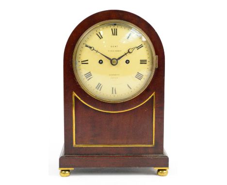 A mid 19th century mahogany mantel clock, the domed case with circular painted dial set with Roman numerals and inscribed "De