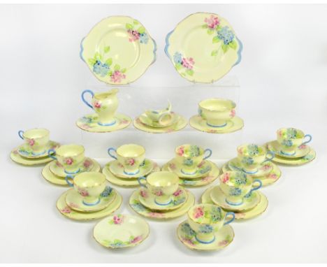 A Paragon "Hortensia" tea service decorated with pink and blue hydrangeas comprising two sandwich plates, twelve tea plates, 