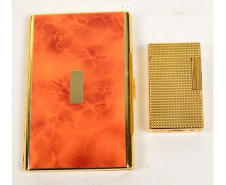 A cased DuPont gold plated textured lighter, no.8203CN and a Calibri cigarette case (2). CONDITION REPORT: Slight wear but ge