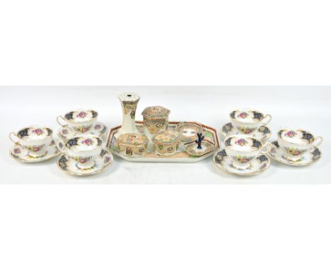 A Corona Ware "Windsor" dressing table set and a set of six floral transfer decorated bone china cups and saucers. CONDITION 