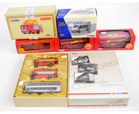 A small collection of modern boxed diecast vehicles comprising a Corgi Hong Kong AEC fire engine, a Corgi police Ford Transit