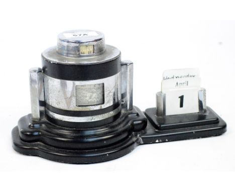 An Art Deco chrome perpetual desk calendar, barometer and thermometer, width 26cm.