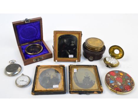 A group lot of collectors' items to include two daguerreotypes, an ambrotype, two reproduction compasses, an open faced pocke