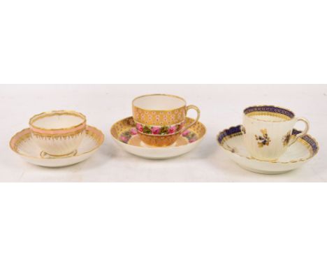 A late 18th century Derby porcelain tea bowl and saucer with moulded body and hand painted landscape scenes by Z.Boreman, gil