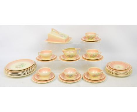 A quantity of Susie Cooper "Dresden Spray" dinner and teaware including twenty-four plates of varying sizes, six cups, eight 