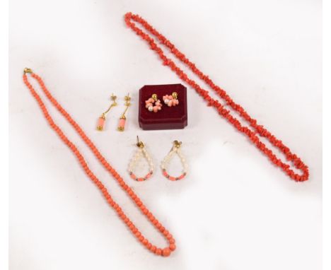 A pair of 14ct yellow gold and coral earrings, a pair of coral and freshwater pearl earrings, and a further pair of coral ear