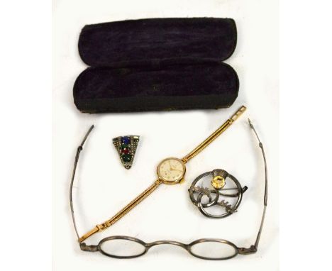 A mixed lot comprising a 9ct gold Cyma lady's manual wind wristwatch on 9ct gold bracelet, a Scottish silver thistle brooch, 