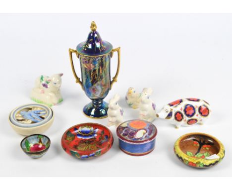 A collection of decorative ceramics comprising a Maling trinket dish, a Royal Crown Derby pig paperweight (without stopper), 