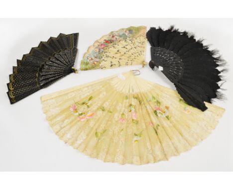 A bone fan with printed decoration depicting three children playing and pierced sticks (guard sticks missing), a further bone