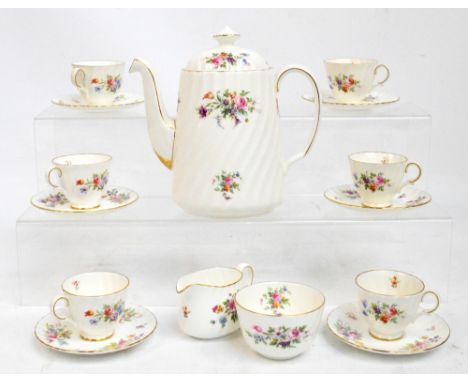 A Minton "Marlow" floral decorated coffee service comprising coffee pot, six cups, six saucers, jug and bowl. CONDITION REPOR