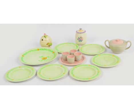 A mixed lot of decorative ceramics to include a Poole Pottery preserve jar, a Clarice Cliff preserve jar, a set of four Poole