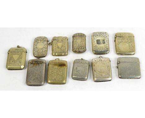 Eleven various vesta cases including silver plated rounded rectangular examples, one engraved with a bird amongst floral spra