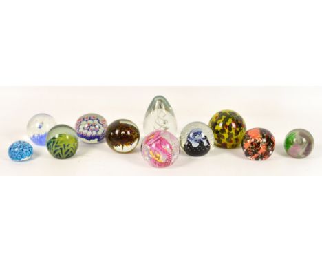 A collection of glass paperweights including Caithness, Mdina, Wedgwood and possibly Whitefriars (11). CONDITION REPORT: Cait