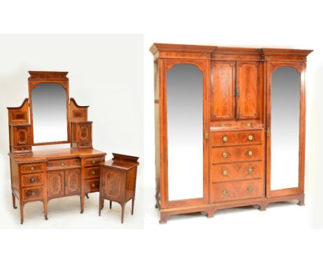 An Edwardian mahogany and satinwood crossbanded three piece bedroom suite comprising wardrobe with inverted breakfront moulde