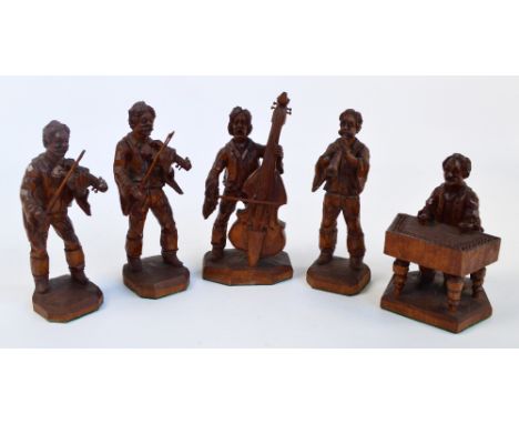 A set of five German carved figures of musicians; double bass player, two violinists, a clarinet player and a glockenspiel pl