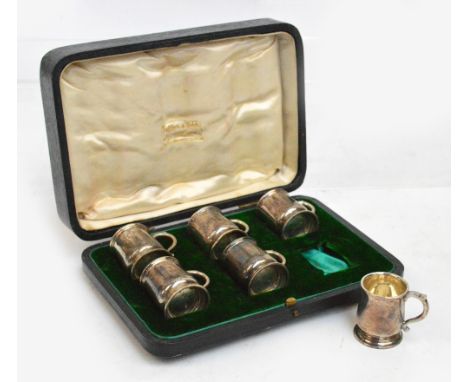 A cased set of six George V hallmarked silver tot cups modelled as mugs, Mappin & Webb, Birmingham 1912, height approx 5.5ozt