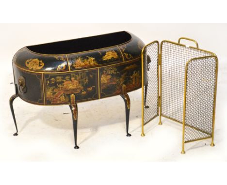 A 20th century Tole Peinte planter of demi-lune form, with chinoiserie decoration throughout, raised on four scrolling suppor