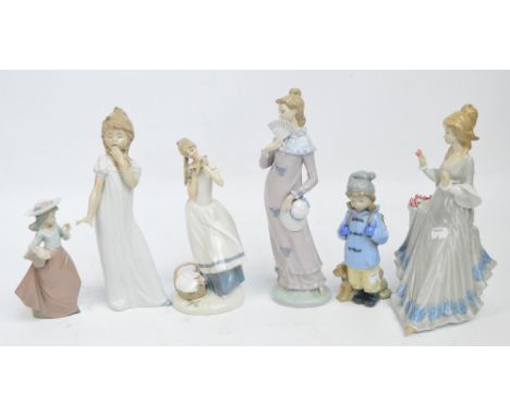 Four Nao figures; girl with fan, girl holding hand to mouth, girl in hat and girl wearing rucksack, also two further similar 