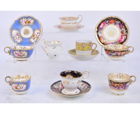A quantity of 19th century Coalport porcelain teaware comprising eight cups and five saucers, each painted with floral sprays