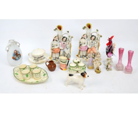 A small quantity of ceramic items including Staffordshire flat back figural spill holders, a Royal Doulton "Countess" egg cup
