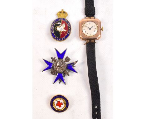 A 1920s lady's 9ct gold square section wristwatch, the circular dial set with Roman numerals and fabric strap, a blue enamel 