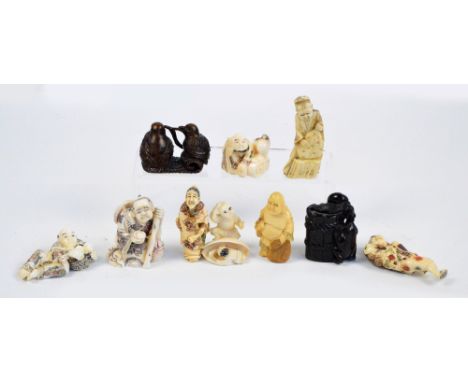 A collection of eight decorative 20th century Chinese and Japanese carved bone netsuke and two boxwood examples (10).