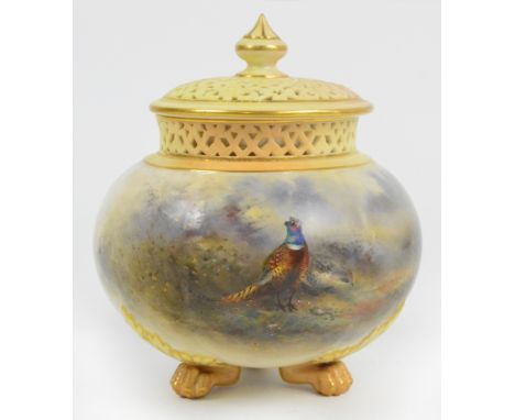 A Royal Worcester Grainger pot pourri bowl and cover, the pierced scrolling cover above pierced neck and main body decorated 