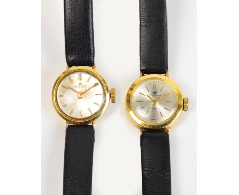 BUCHERER; two 1970's 18ct gold cased lady's manual wind wristwatches, each with circular dial set with baton numerals on blac