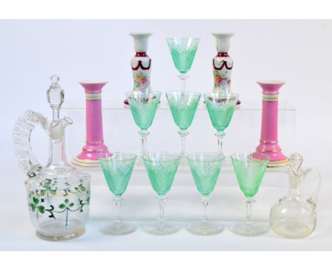 A set of eight cut clear and green wine glasses, a late 19th century shamrock decorated decanter with loop handle and a small