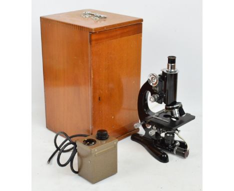 A cased Beck of London model 47 electric monocular microscope, numbered 33533.