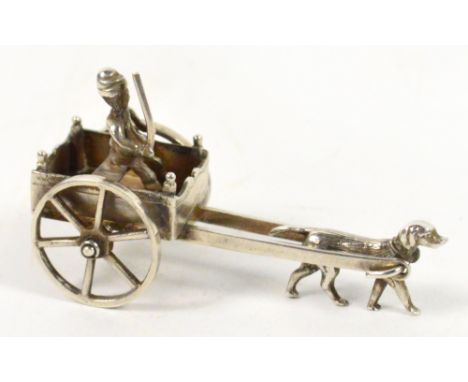 A late 19th century Dutch silver miniature model of a cart pulled by a dog, silver standard 0.833, stamped with export mark, 