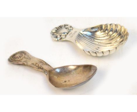 An Elizabeth II hallmarked silver caddy spoon with shell moulded bowl, Birmingham 1986, and a George III Irish caddy spoon, D