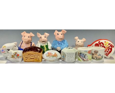 A set of four Nat West Piggy Banks; others money boxes, Wedgwood Peter Rabbit and Thomas The Tank Engine; a Carlton Ware pigg