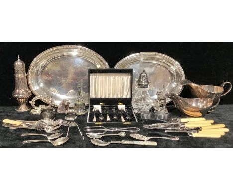 An EPNS oval entrée dish and cover; two silver plated sauce boats; a 19th century style silver plated pedestal sugar caster; 