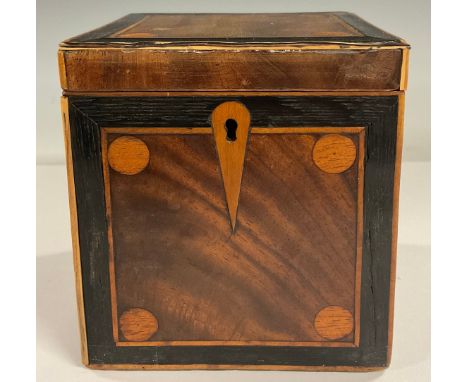A GIII cube tea caddy, the hinged cover front and sides inlaid with boxwood roundels within ebony and boxwood cross-banded bo