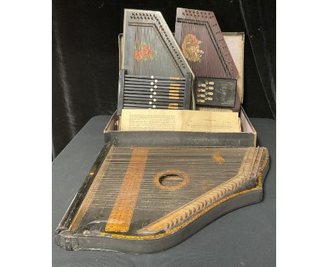 A late 19th/early 20th century Reynolds Excelsior Harp, boxed; another similar; a 19th century zither (3) 