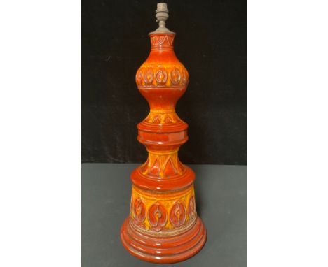 A large mid 19th century pottery lamp 