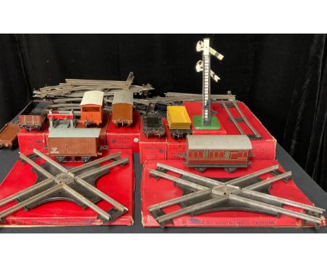 Toys &amp; Juvenalia - a collection of Hornby O Gauge rolling stock, track pieces and accessories, some boxed examples includ