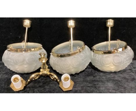 A set of three Art Deco style frosted glass ceiling lights; a brass wall light (4) 